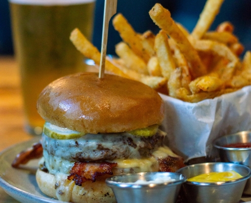 le gaudin double burger, fries, and a cold beer
